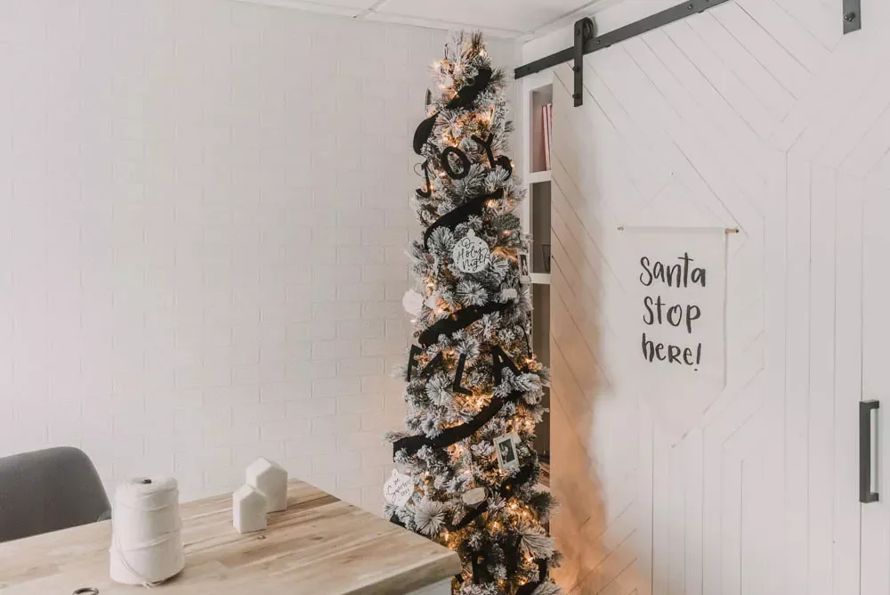 27 Stunning Flocked Christmas Tree Ideas That Transform Your Holiday Decor 6 Go Classic With Black and White