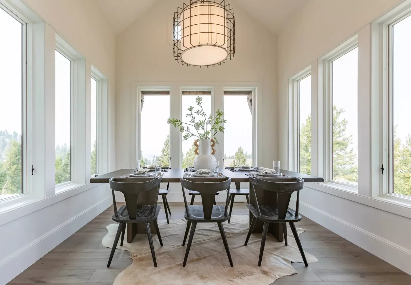 35 Beautiful Dining Room Rug Ideas That Will Transform Your Space 25 Go Organic With a Faux Hide Rug