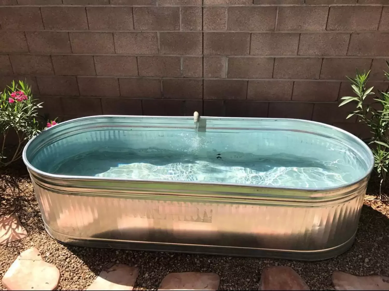 33 Creative Stock Tank Pool Ideas to Transform Your Backyard 32 Go Oval
