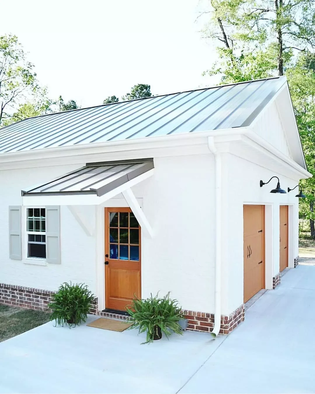 23 Stunning Detached Garage Ideas That Will Transform Your Home's Curb Appeal Go With an Industrial-Style Garage