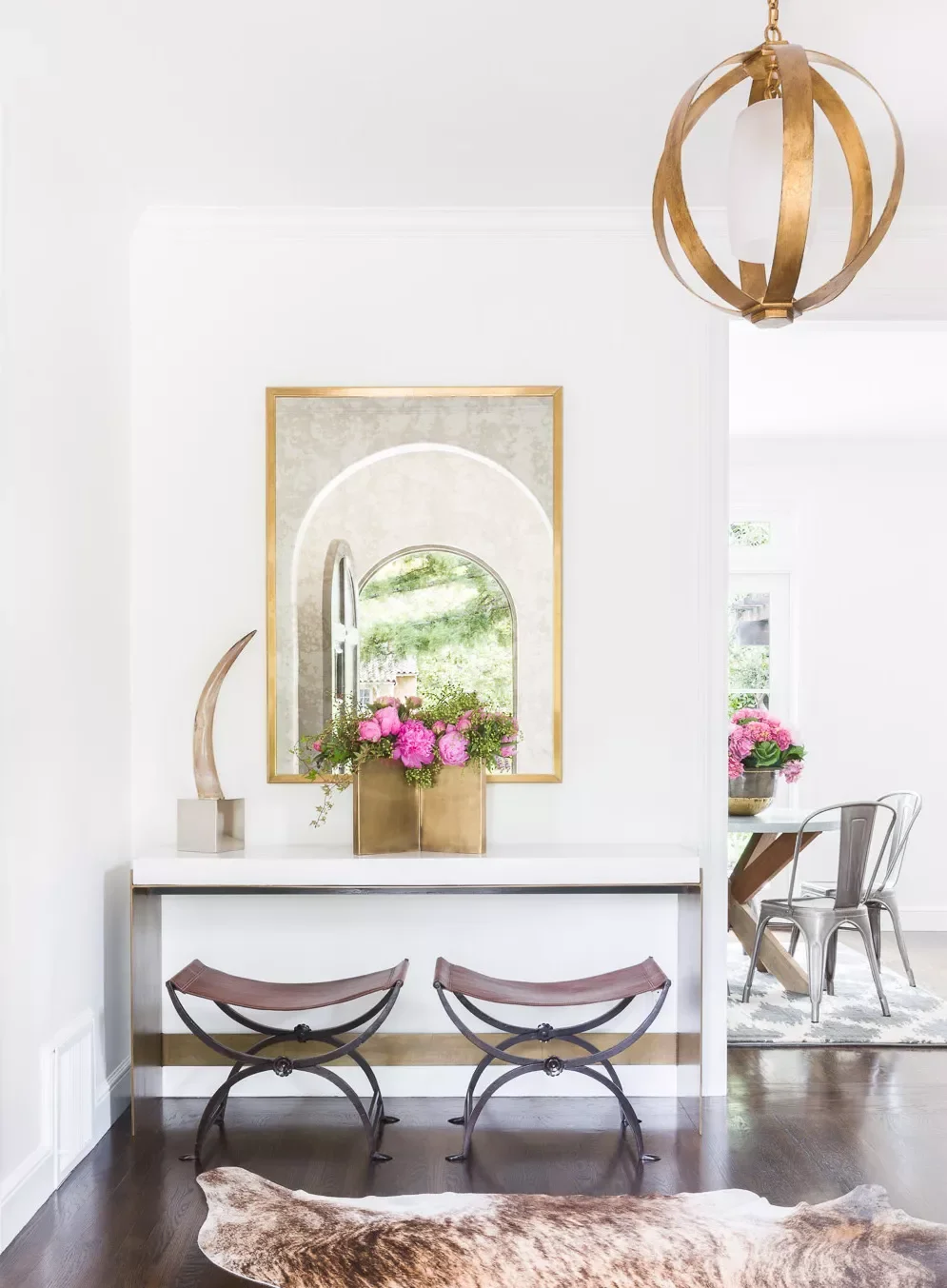 40 Stunning Entryway Lighting Ideas That Will Transform Your Home's First Impression Go for a Rustic Glam Fixture