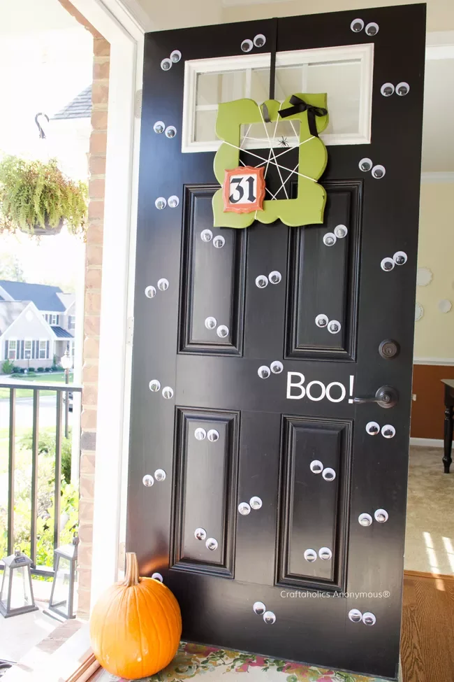 42 Quick Halloween Door Decorations You Can Create in Under an Hour 25 Googly-Eyed Door