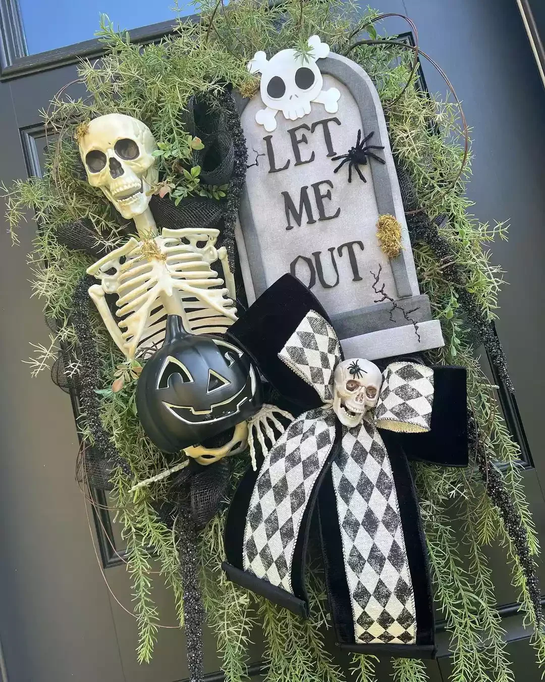 45 Spooktacular Halloween Wreath Ideas That Will Make Your Front Door the Neighborhood's Favorite Stop 40 Graveyard Halloween Wreath