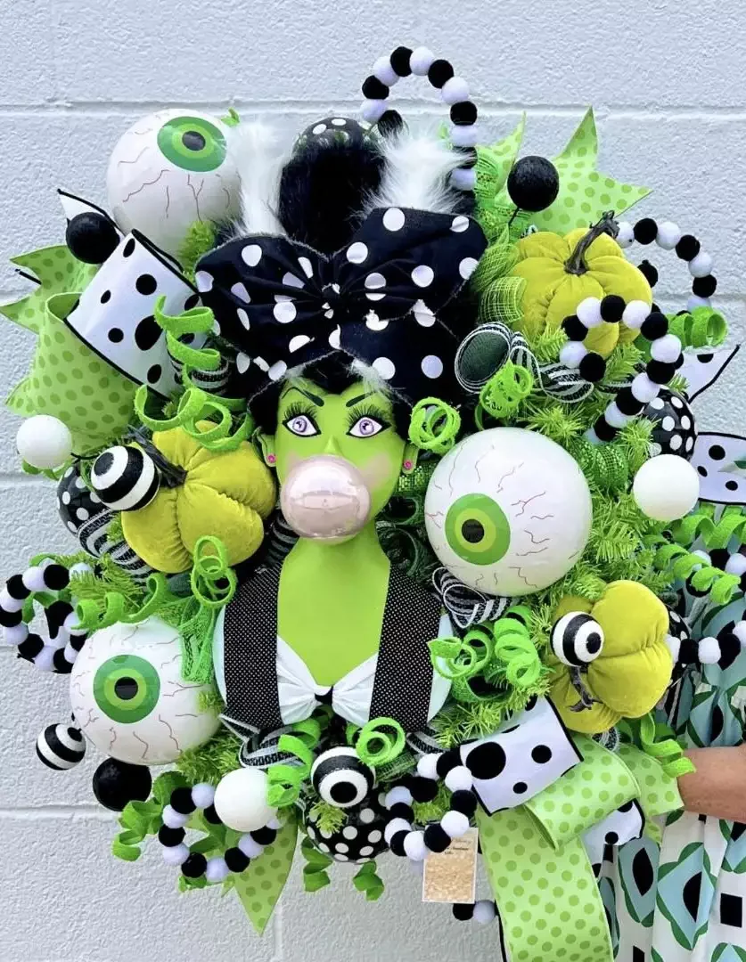 45 Spooktacular Halloween Wreath Ideas That Will Make Your Front Door the Neighborhood's Favorite Stop 27 Green Halloween Wreath