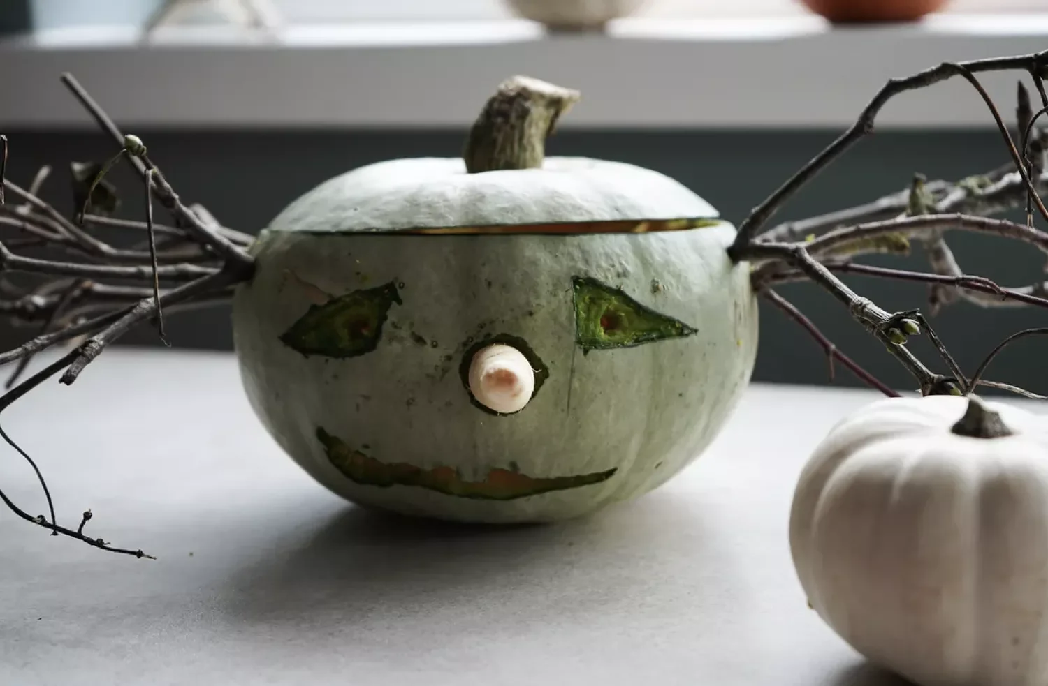 77 Creative Pumpkin Carving Ideas That'll Transform Your Fall Decorating Game 22 Green Witch Pumpkin