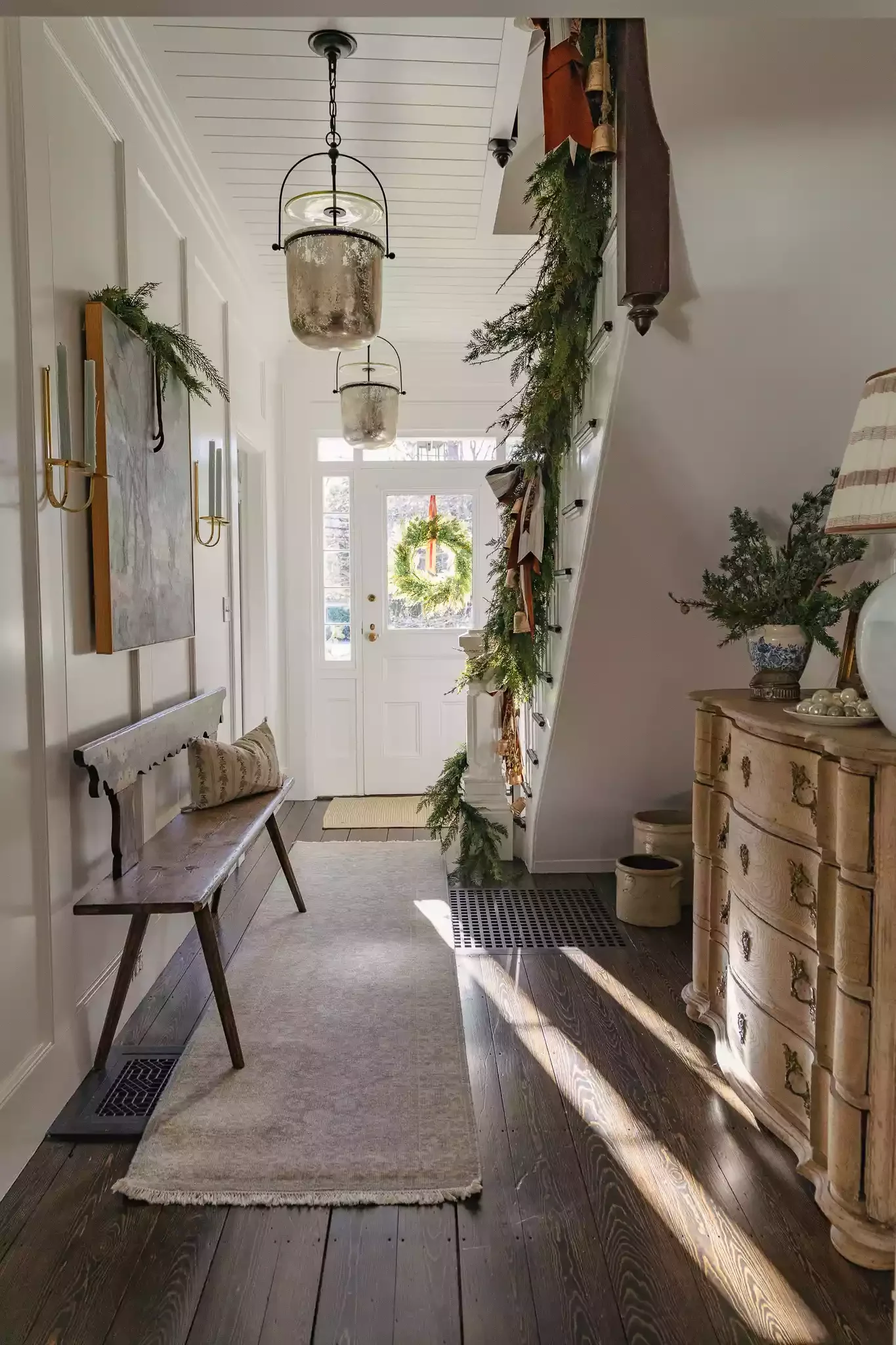 32 Stunning Christmas Wall Decorating Ideas to Transform Your Home Into a Holiday Haven 1 Greenery Adorning Wall Art