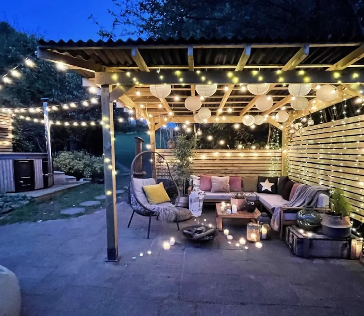 31 Stunning Pergola Ideas to Transform Your Backyard Into a Stylish Retreat 21 Grid Pergola With Paper Lanterns