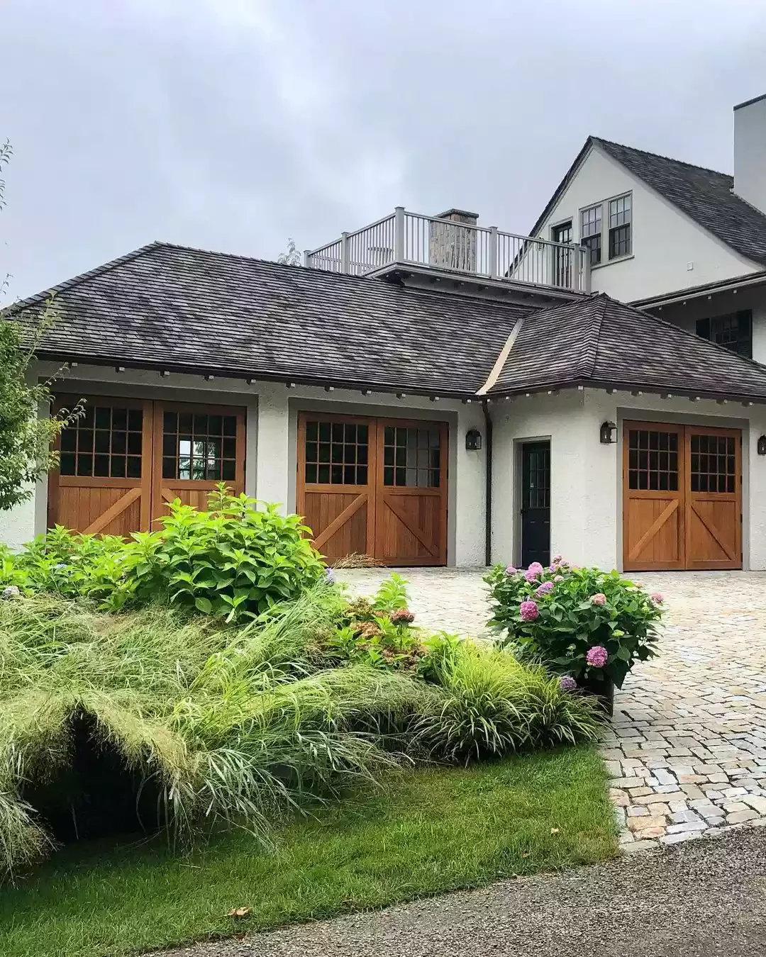 52 Stunning Garage Door Ideas That Will Transform Your Home's Curb Appeal Half Glass Mahogany Swing-Outs