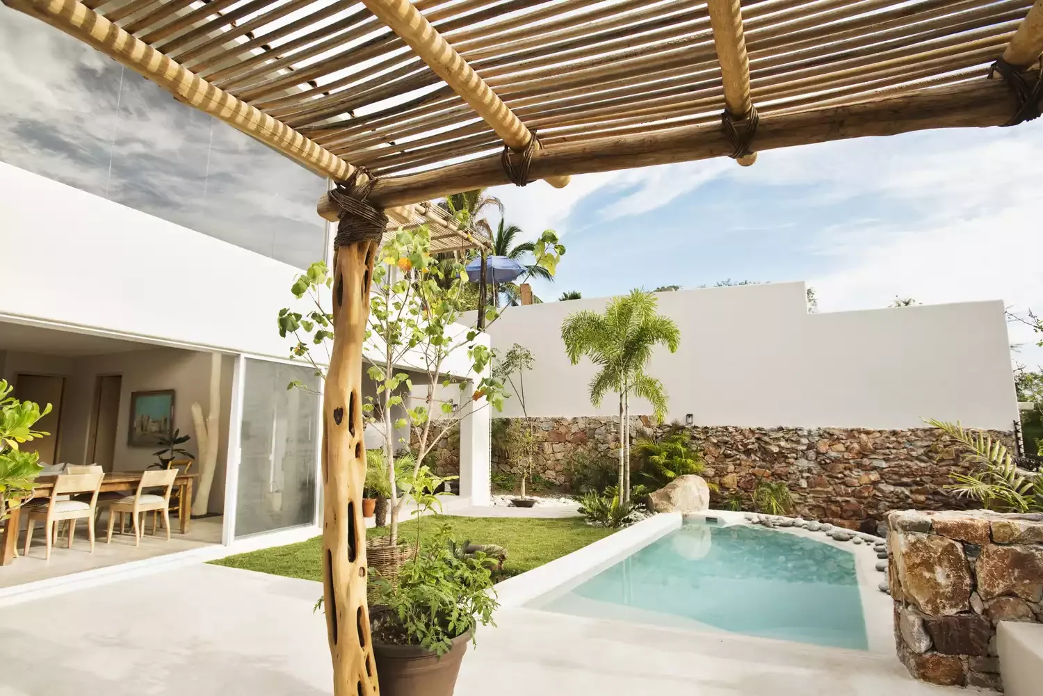 26 Beautiful Pool Barrier Ideas to Transform Your Backyard 23 Half Stone Wall