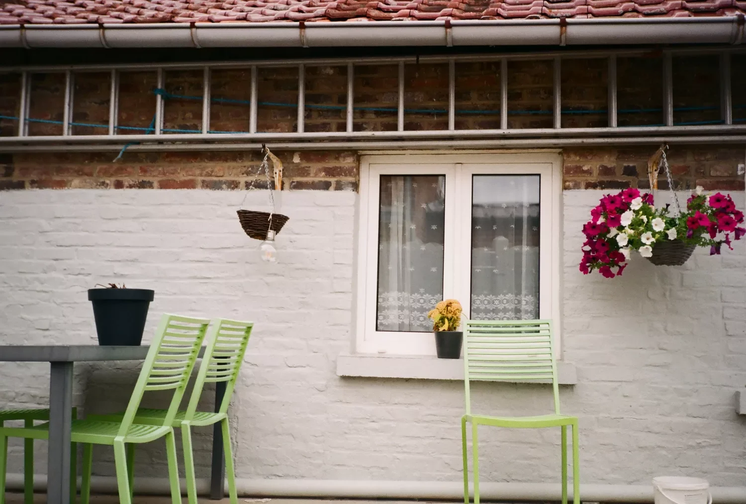21 Bold Brick Paint Colors That Will Transform Your Home's Exterior 14 Half White, Half Exposed