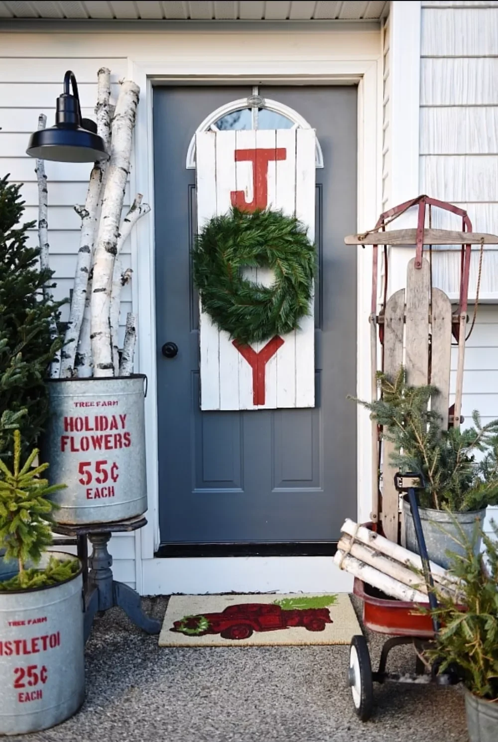 68 Christmas Front Porch Ideas That Make Your Home the Envy Hand-Painted DIY Sign