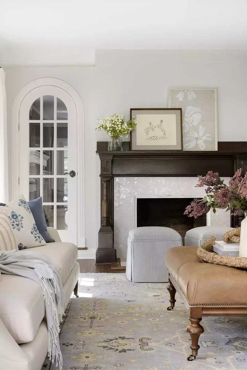 32 Living Room Mantle Decor Ideas That Add Style and Warmth 13 Handsome Vintage Mantel Frame With Fresh Flowers and Art