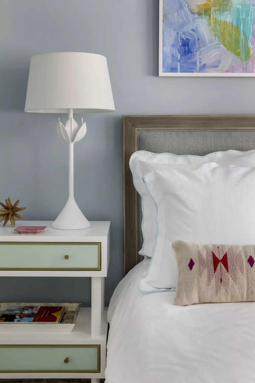 31 Luxurious Bedroom Design Ideas That Transform Your Space Into a Five-Star Retreat 10 Hang Abstract Art