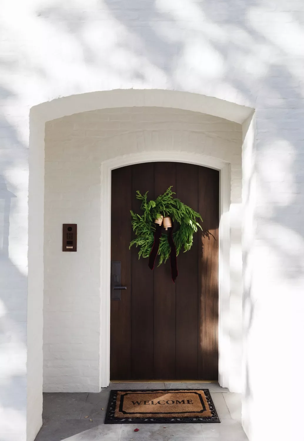 57 Stunning Outdoor Christmas Decorating Ideas That Will Transform Your Home's Holiday Curb Appeal 48 Hang Bells From a Wreath