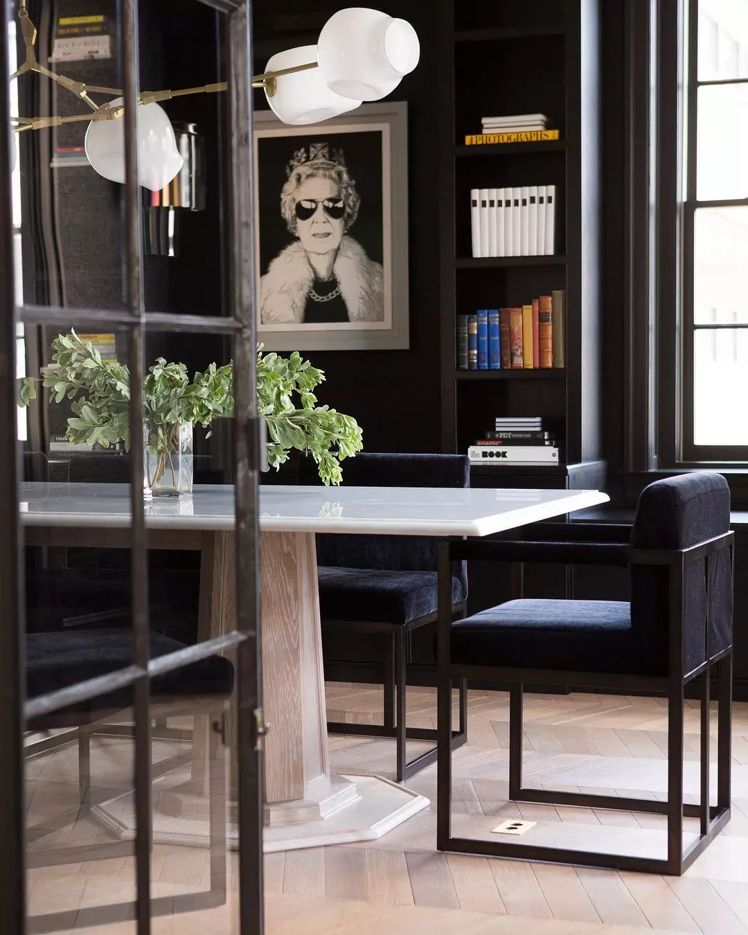 40 Stunning Black Dining Room Ideas to Transform Your Space 12 Hang Black and White Photos