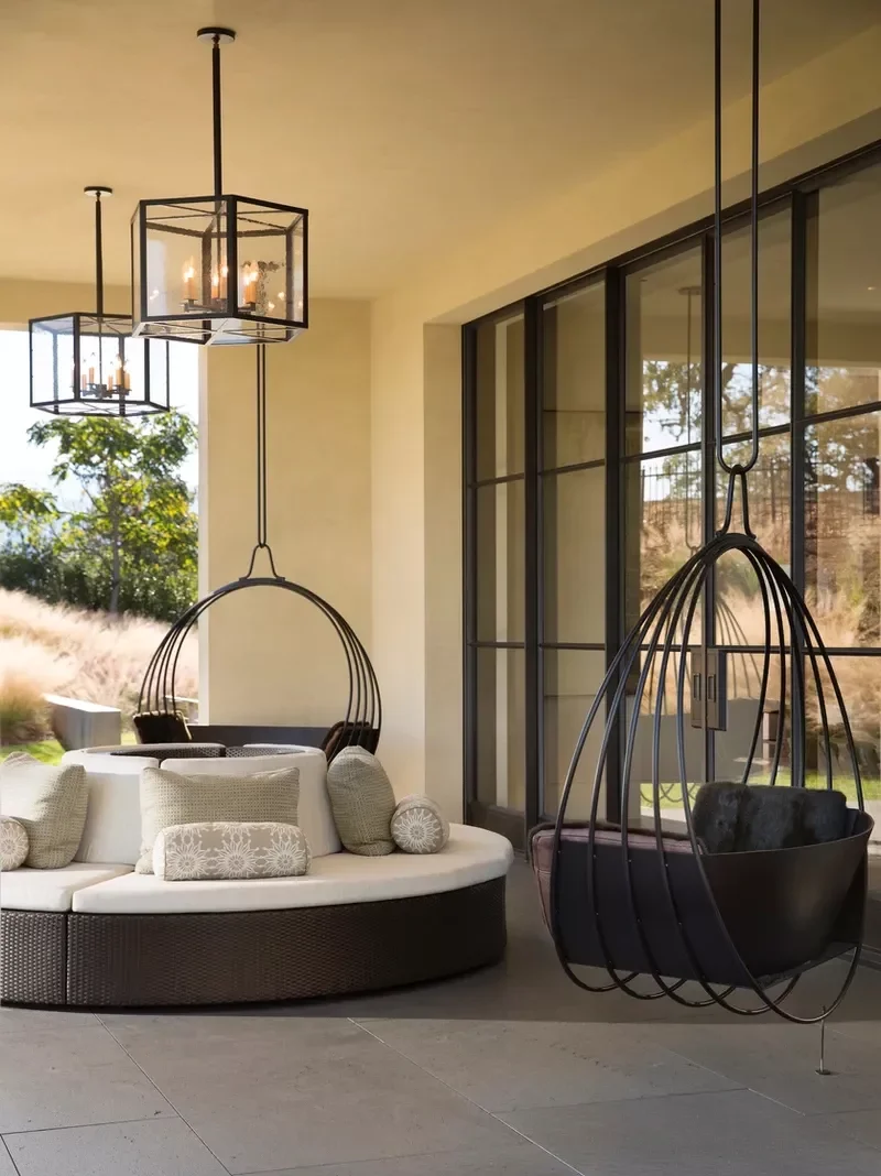 25 Front Patio Ideas That Transform Into an Inviting Haven Hang Chairs and Pendants