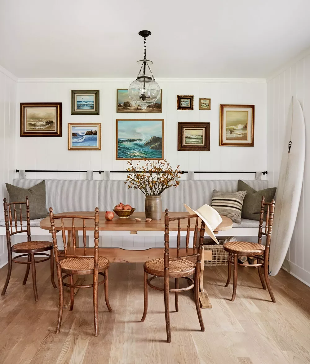 32 Modern Farmhouse Dining Room Ideas That Bring Rustic Warmth to Your Home Hang Coastal-Themed Art