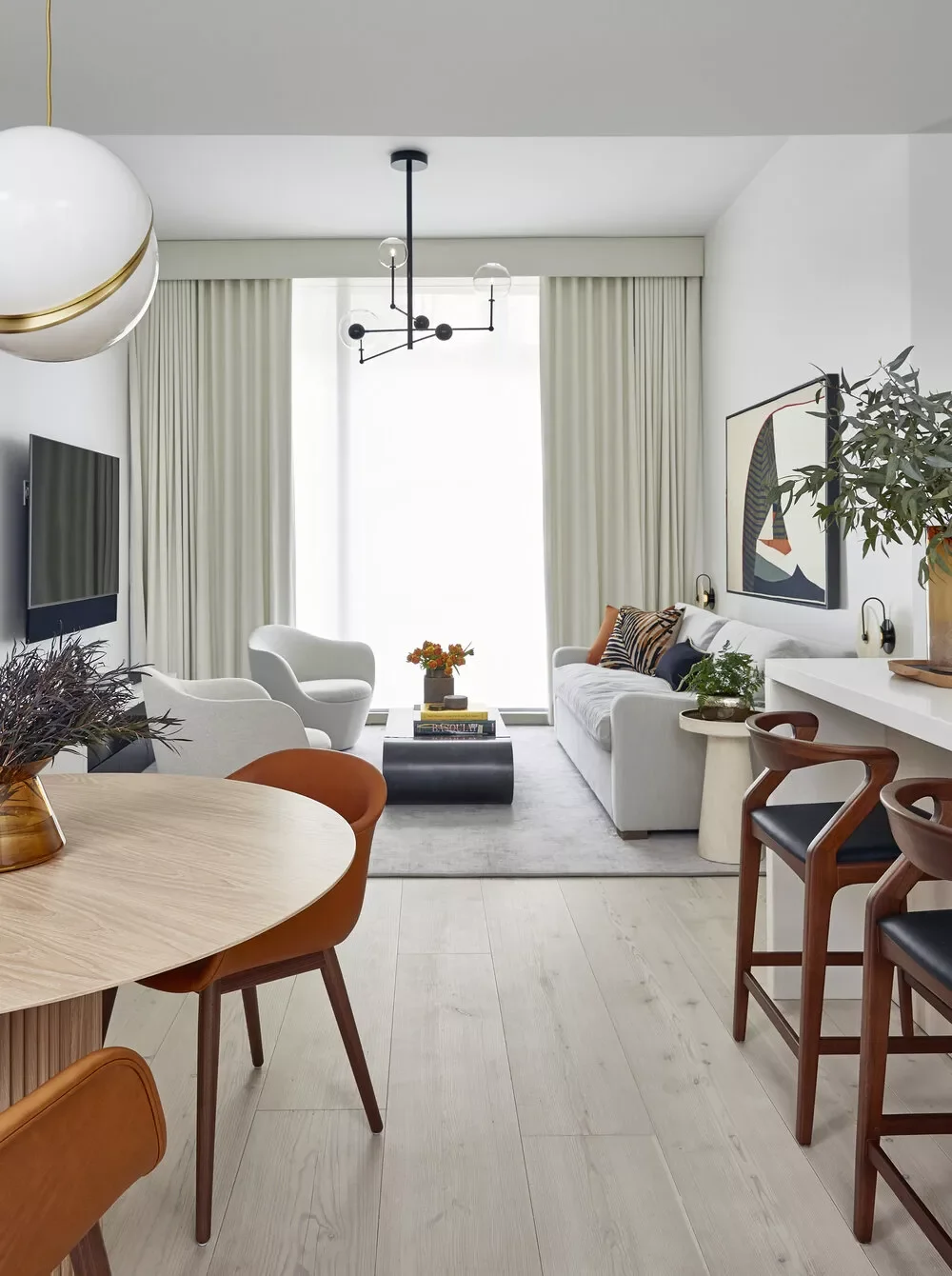 41 Smart Apartment Decorating Ideas to Transform Your Small Space Into a Stylish Home 36 Hang Curtains High
