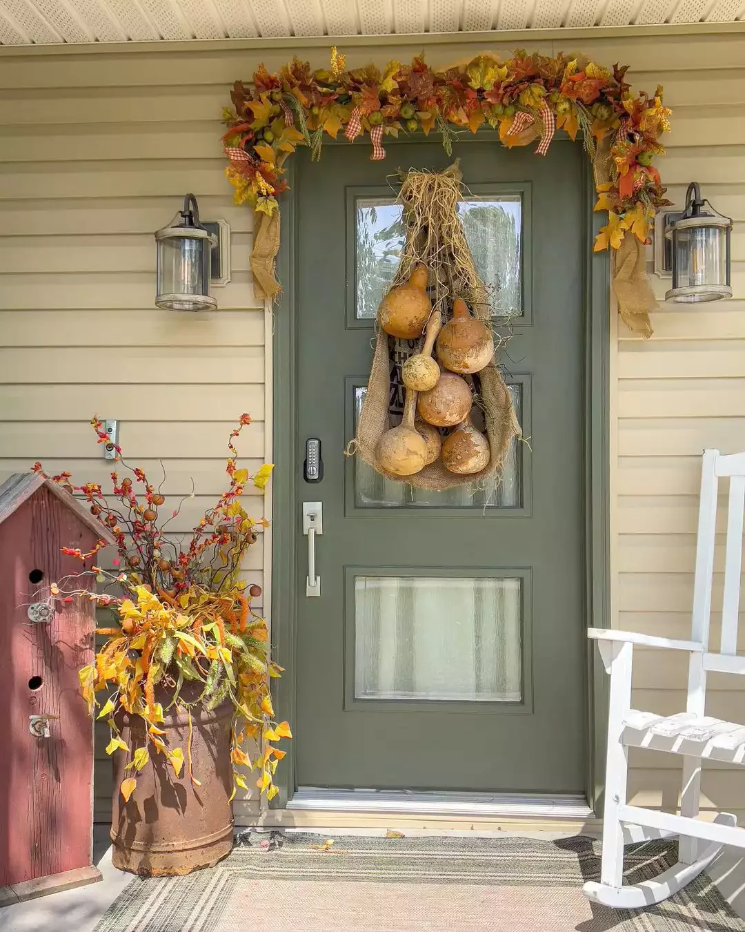 52 Autumn Front Porch Ideas That Will Transform Your Home's Entrance This Fall 40 Hang Dried Gourds