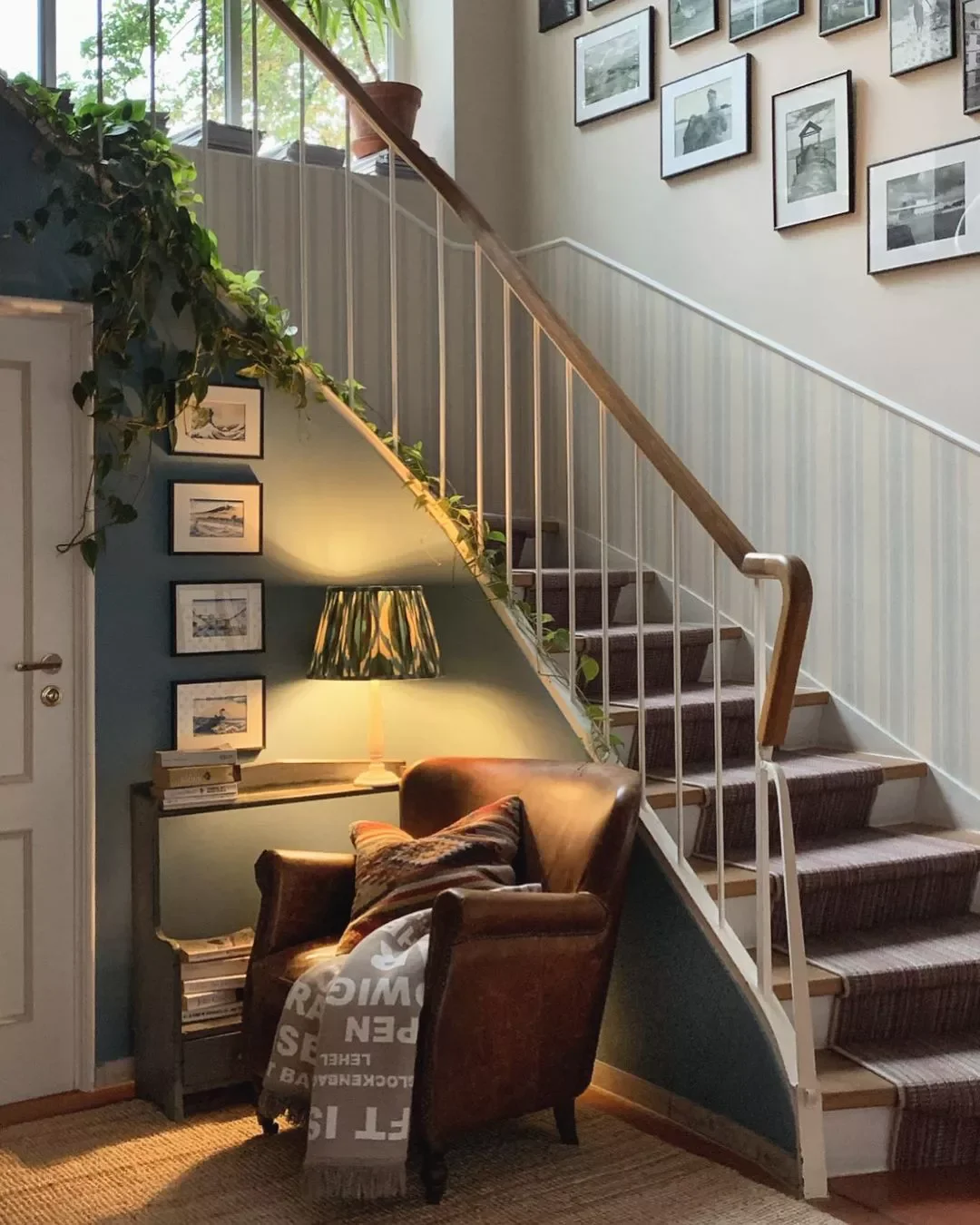 30 Creative Staircase Wall Decorating Ideas That Will Transform Your Space 25 Hang Frames Down Below