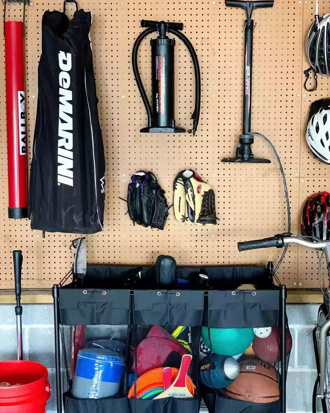 18 Smart Bike Storage Solutions for Your Garage Space Hang Helmets on a Peg Board
