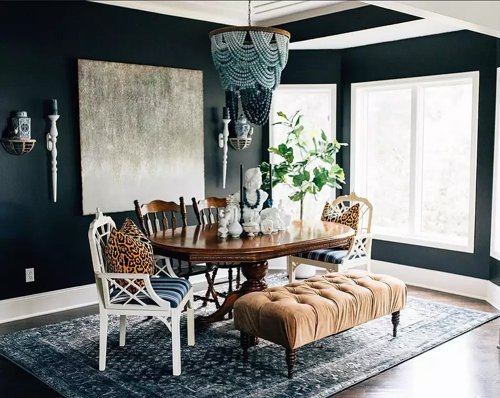 40 Stunning Black Dining Room Ideas to Transform Your Space 9 Hang Large-Scale Art