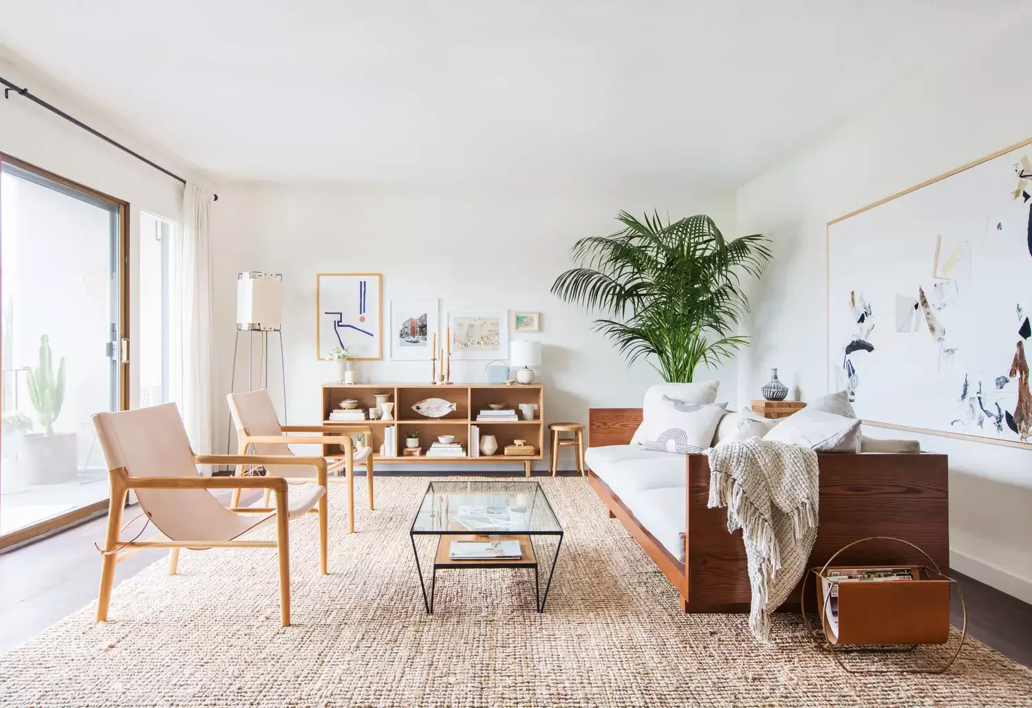 40 Stunning Minimalist Living Room Ideas That Showcase Effortless Style 35 Hang Large-Scale Art