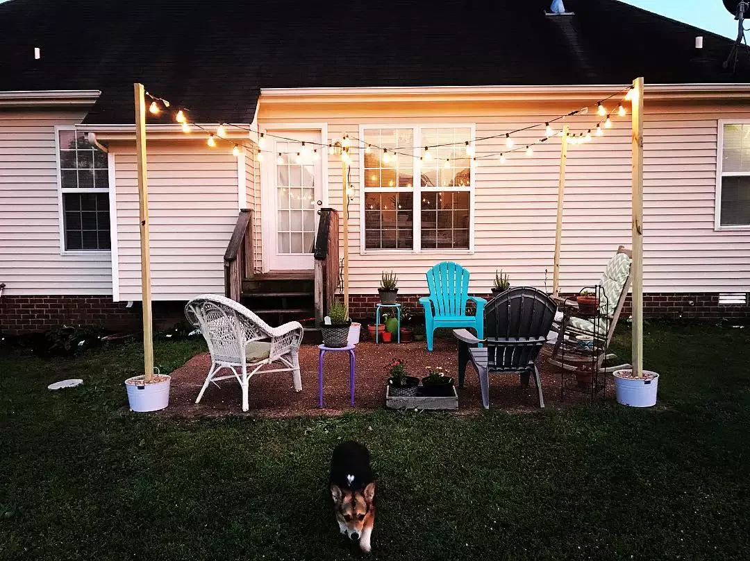 30 Beautiful Ways to Transform Your Patio with String Lights 4 Hang Lights From Poles