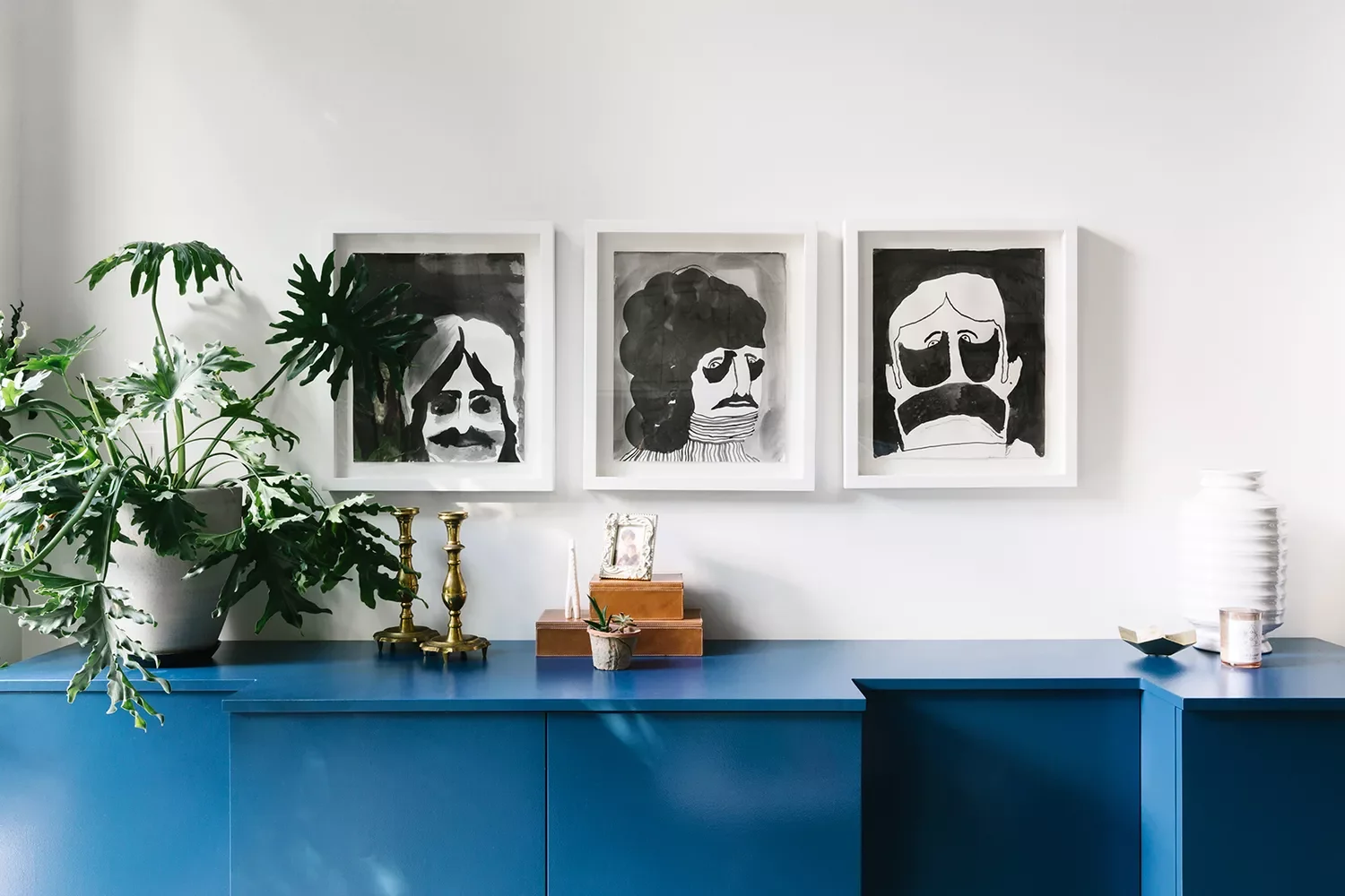 30 Beautiful Ways to Style Your Sideboard in Every Room Hang Lots of Art