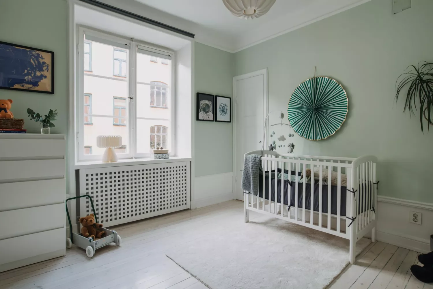 27 Beautiful Sage Green Nursery Ideas to Create Your Baby's Peaceful Haven 21 Hang Sage Wall Decor