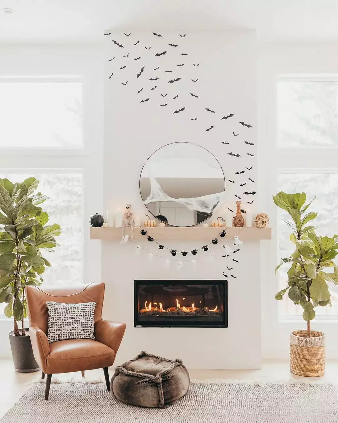 30 Enchanting Halloween Fireplace Mantel Ideas to Transform Your Space 26 Hang Some Bats