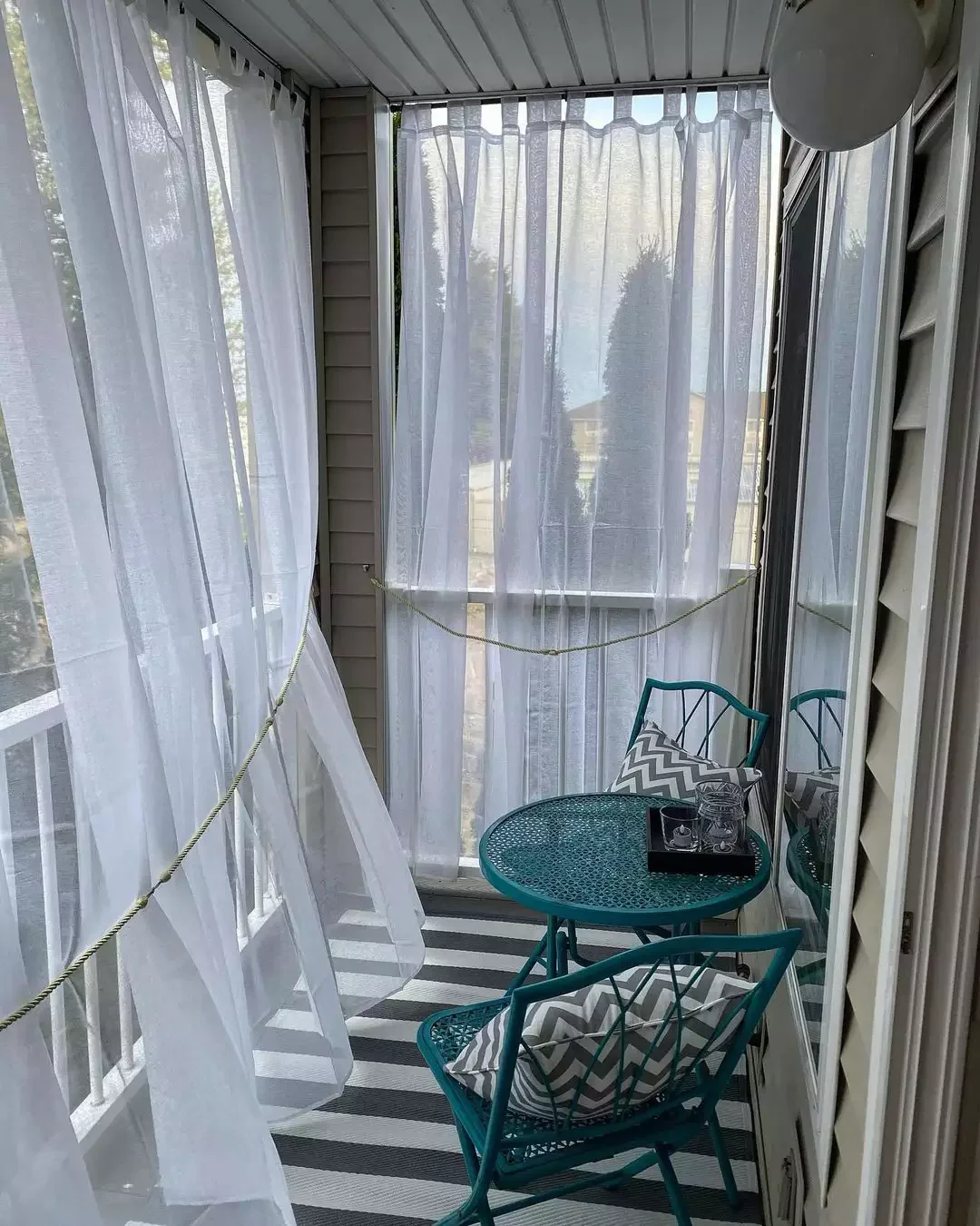 22 Creative Ways to Add Privacy to Your Balcony Space 1 Hang Some Curtains