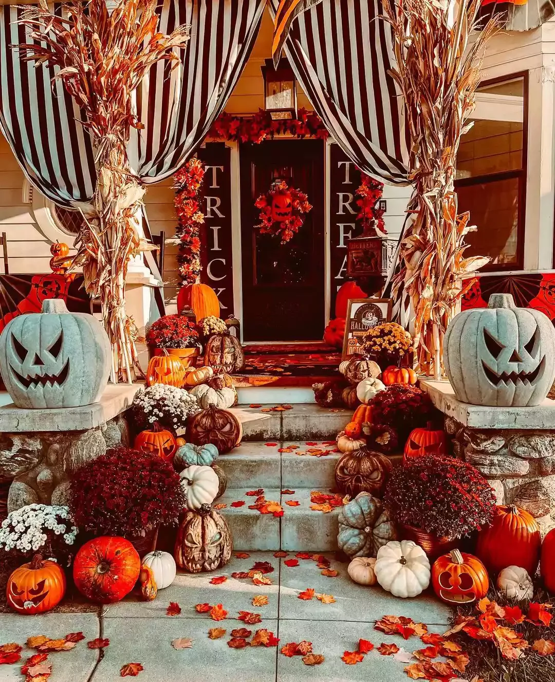 33 Spooktacular Halloween Front Porch Ideas That'll Make Your Home the Neighborhood's Must-See Destination 1 Hang Some Dramatic Curtains