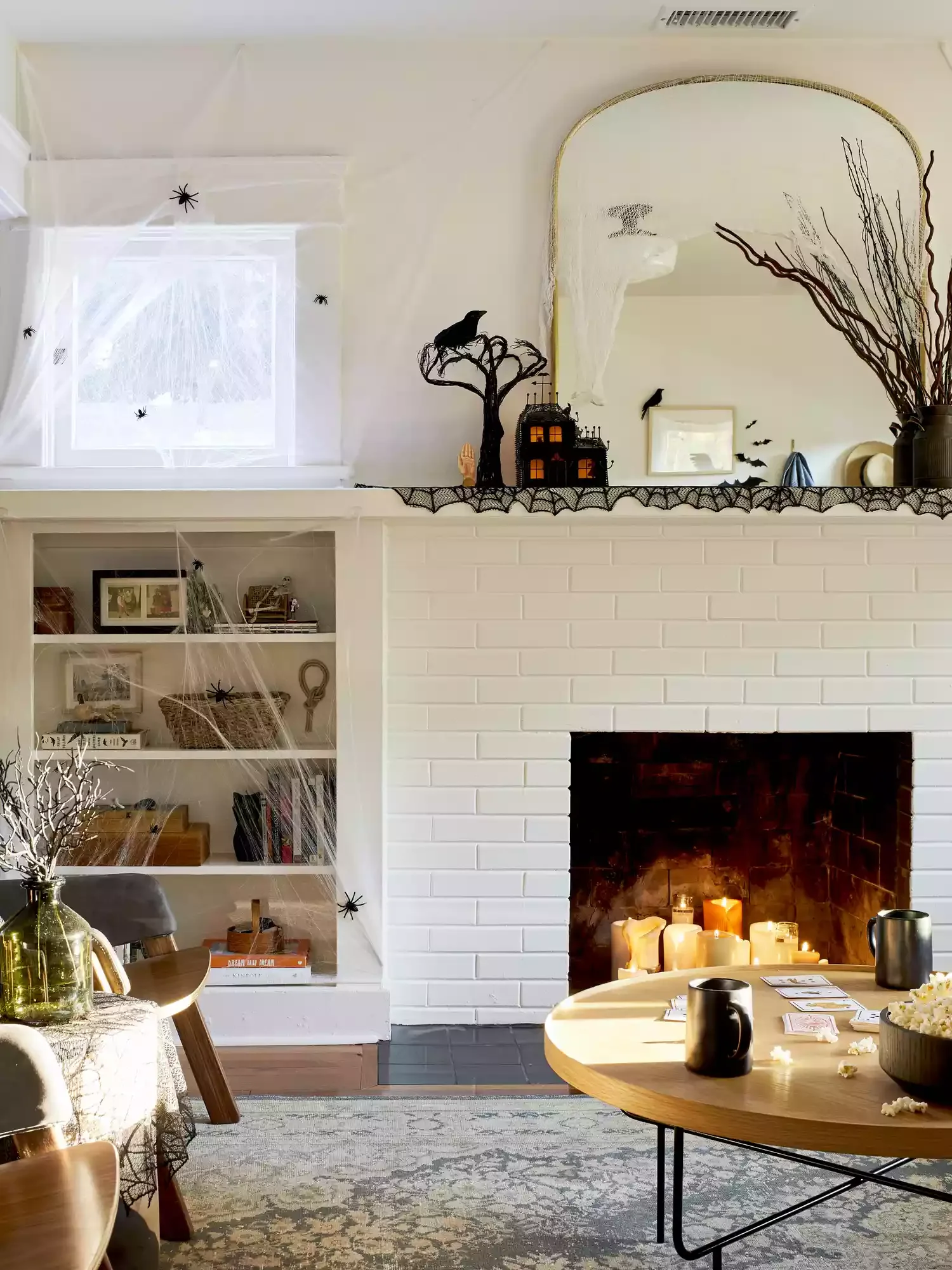30 Enchanting Halloween Fireplace Mantel Ideas to Transform Your Space 18 Hang Some Faux Cobwebs