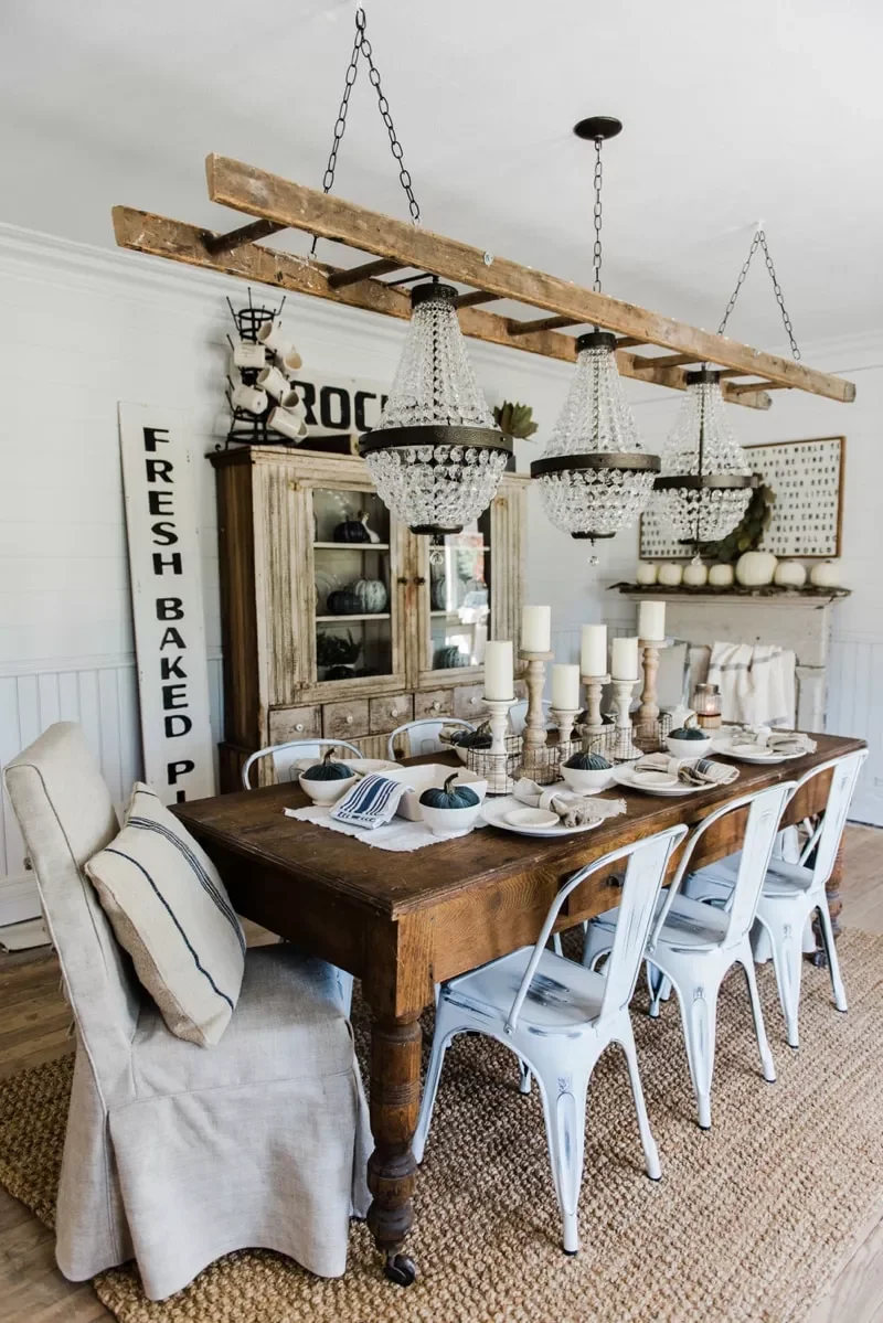 32 Modern Farmhouse Dining Room Ideas That Bring Rustic Warmth to Your Home Hang Vintage Signs