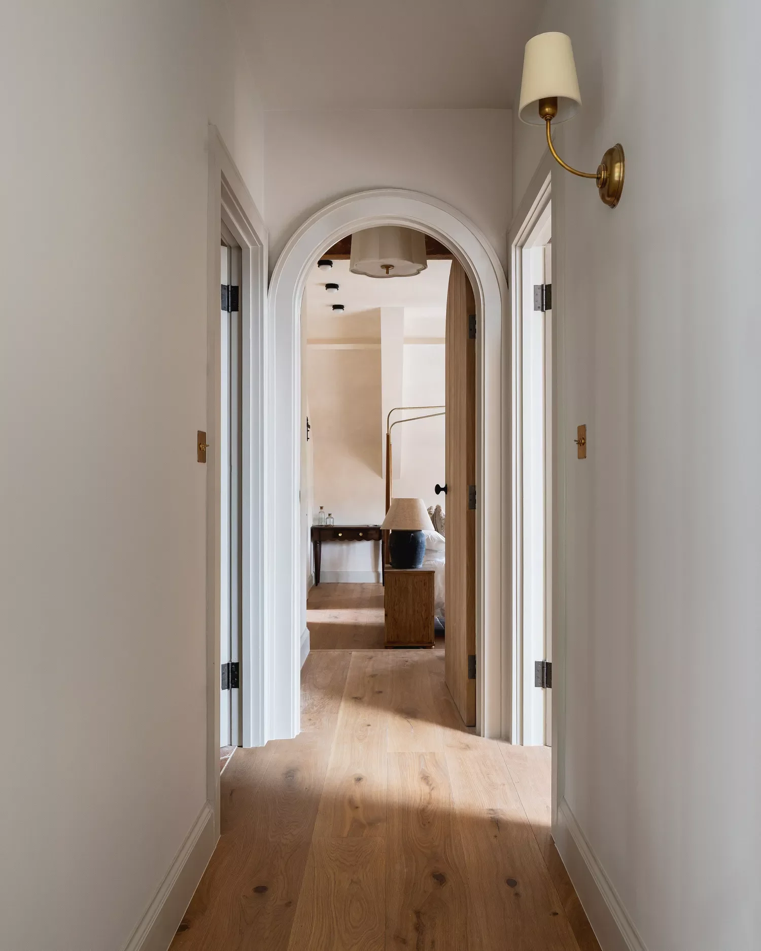 30 Smart Ways to Transform Your Narrow Hallway Into a Stylish Space 11 Hang Wall Sconces