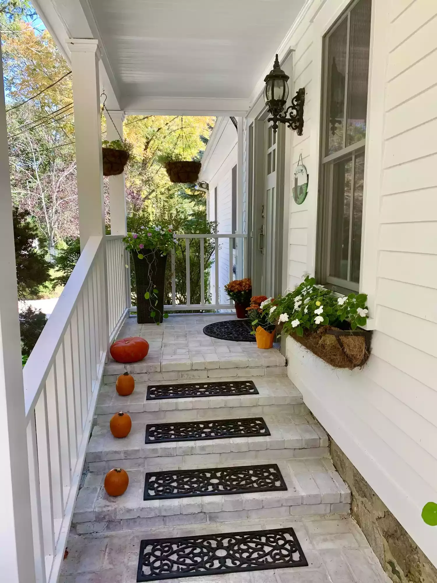 38 Charming Farmhouse Porch Ideas That Create the Perfect Welcome 33 Hang Window Boxes