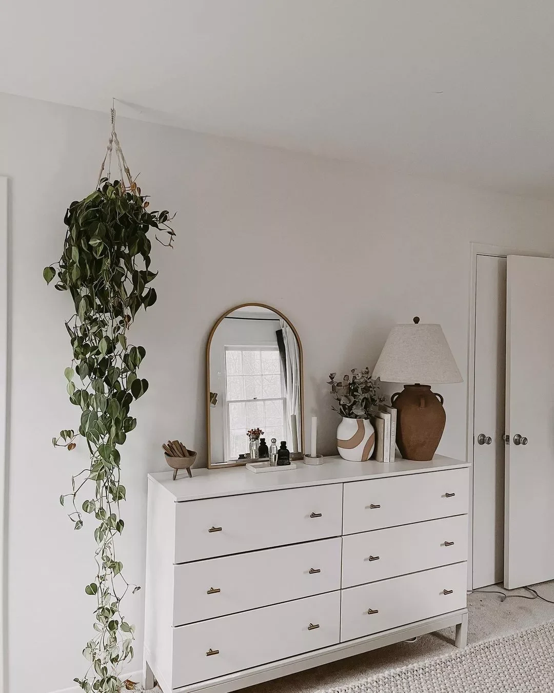 36 Beautiful Dresser Styling Ideas That Will Transform Your Bedroom 24 Hang a Ceiling Mounted Plant