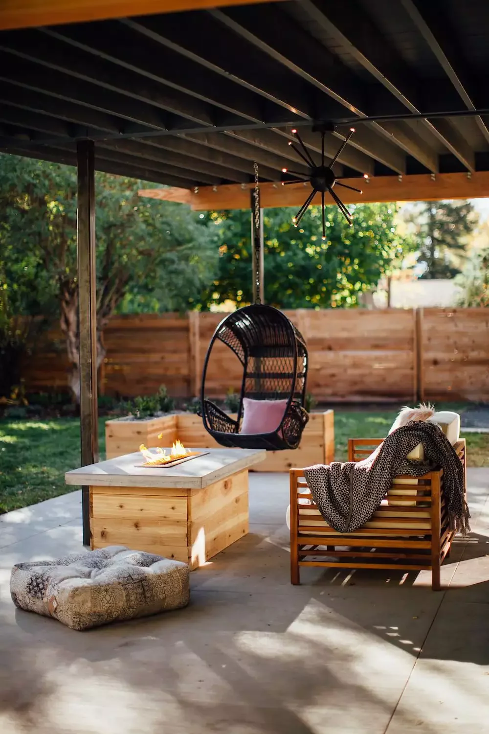 50 Stunning Patio Cover Ideas to Transform Your Outdoor Space Hang a Chair from the Roof
