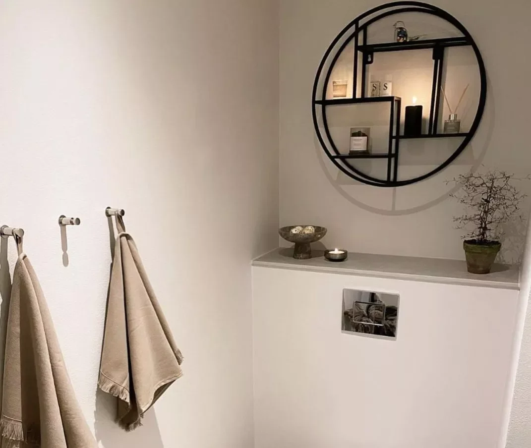 17 Brilliant Above-Toilet Storage Solutions That'll Transform Your Bathroom Hang a Circular Shelf