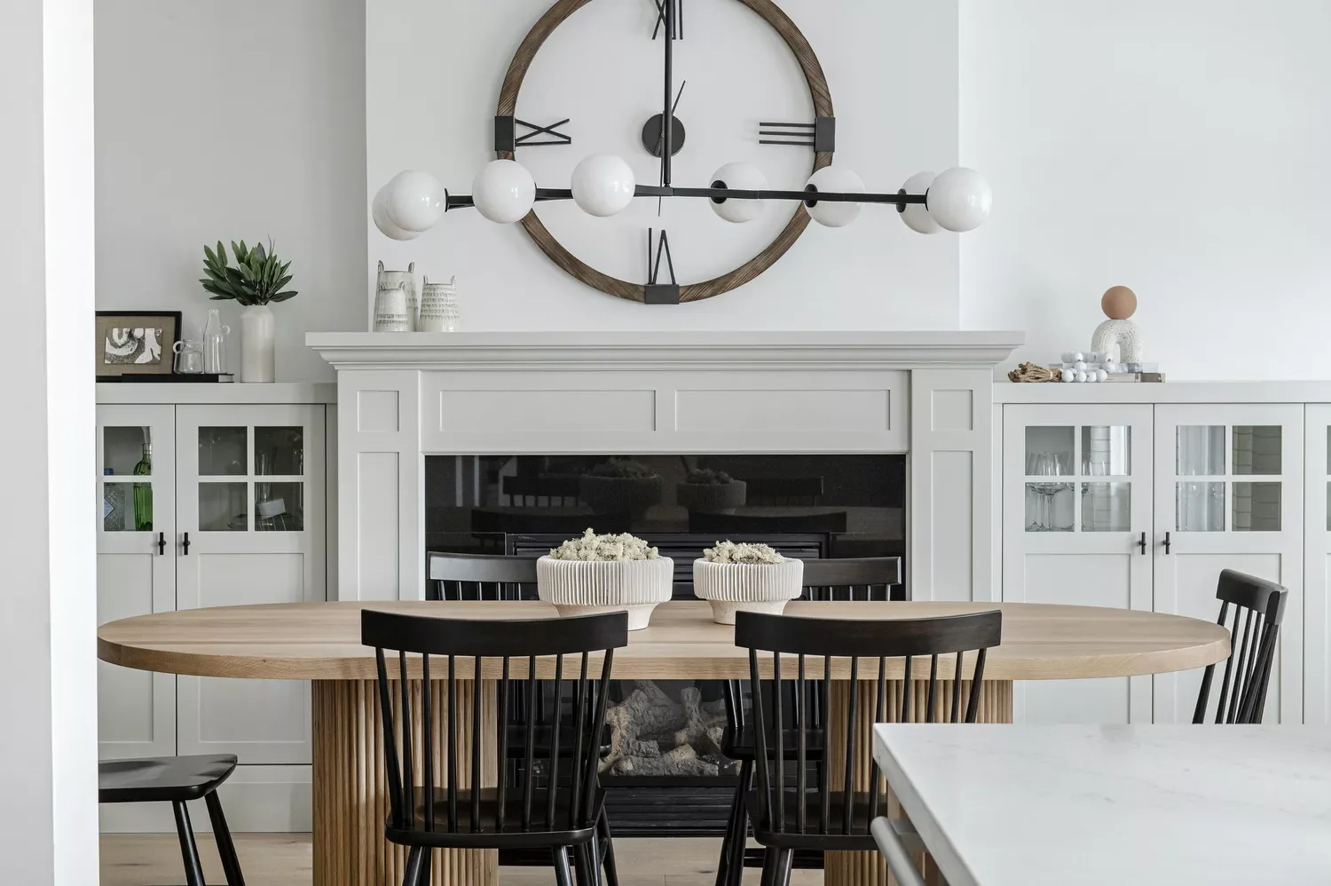 32 Modern Farmhouse Dining Room Ideas That Bring Rustic Warmth to Your Home Hang a Decorative Clock
