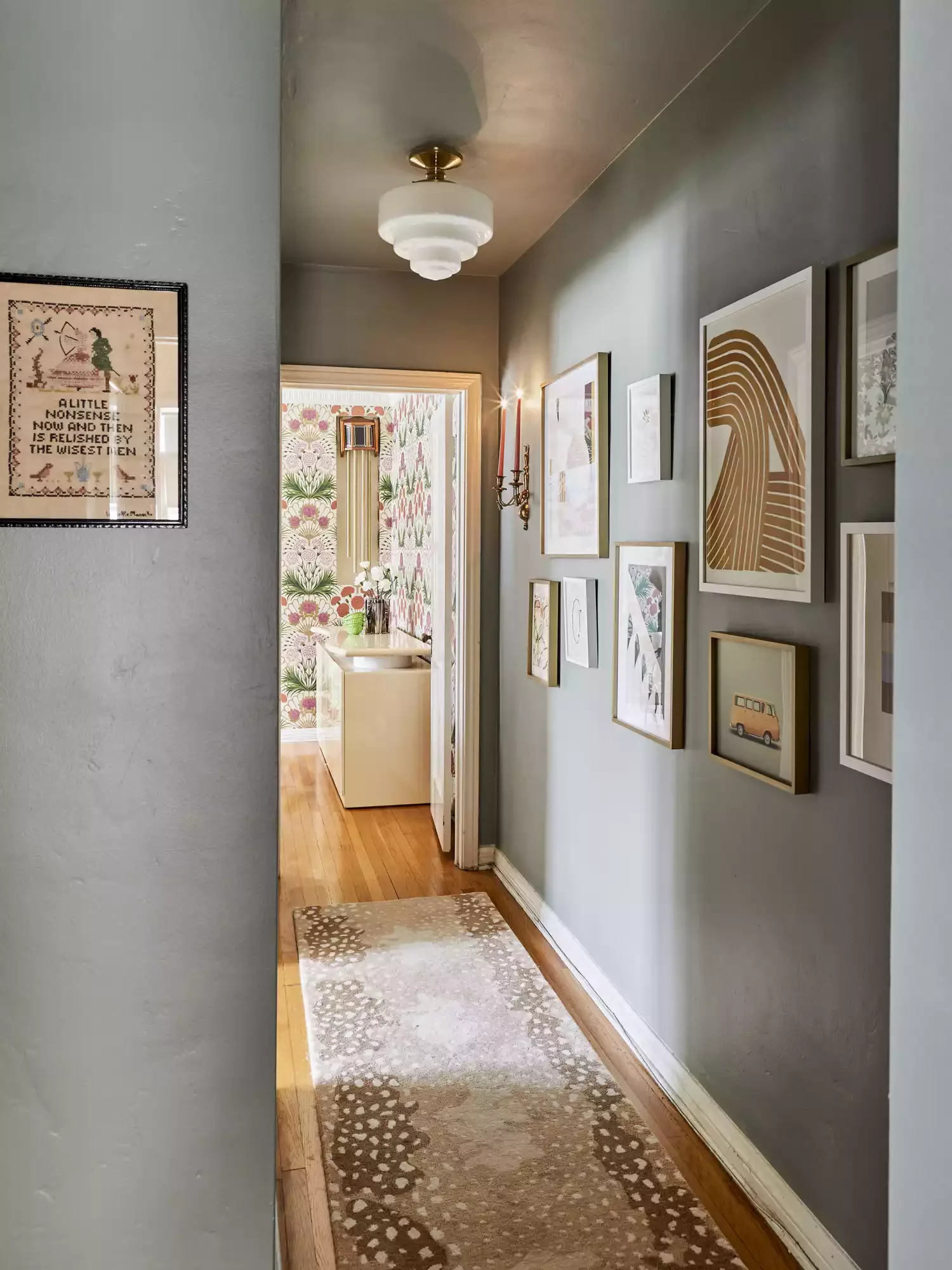 30 Smart Ways to Transform Your Narrow Hallway Into a Stylish Space 13 Hang a Gallery Wall