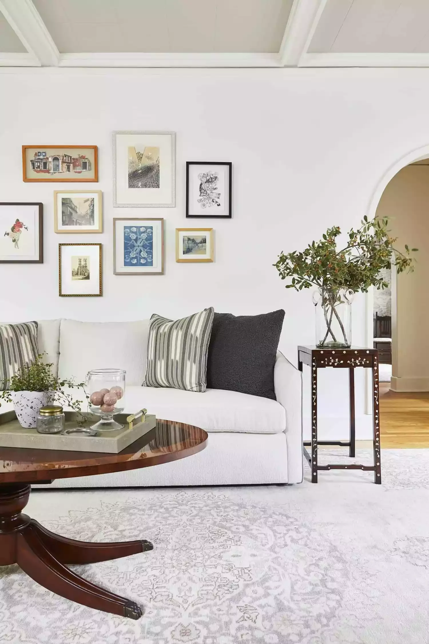 25 Stunning White Living Room Ideas That Transform Your Space 2 Hang a Gallery Wall