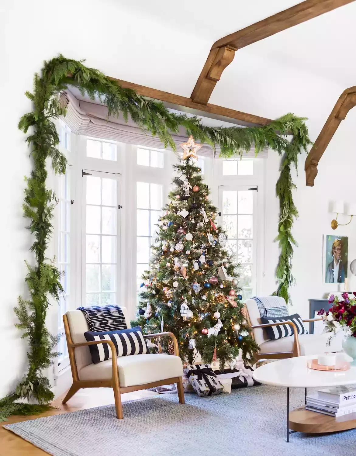 50 Christmas Decorating Ideas That Create a Designer Wonderland Hang a Giant Window Garland