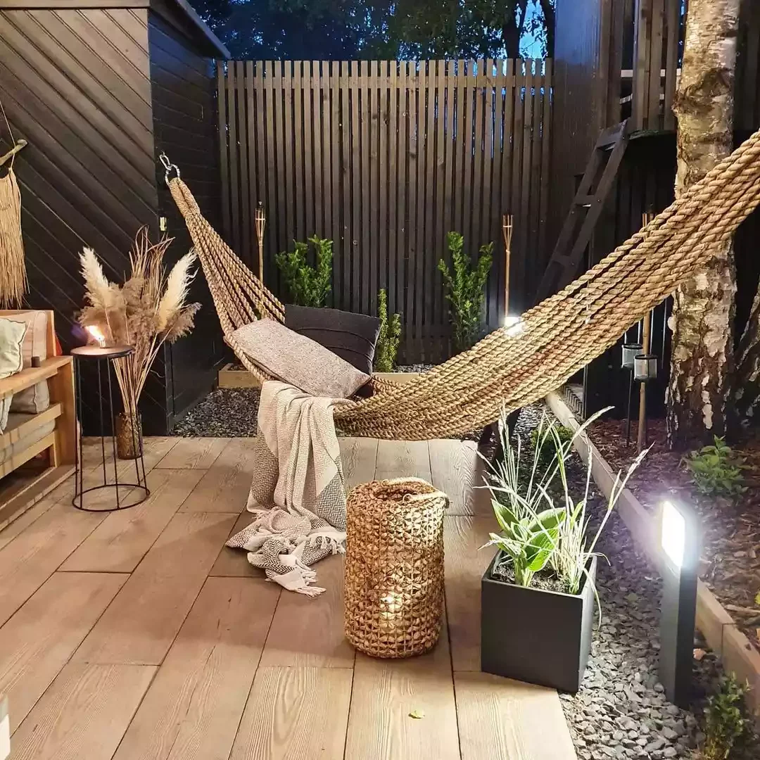 21 Creative Ways to Transform Your Apartment Patio Into an Outdoor Haven 10 Hang a Hammock