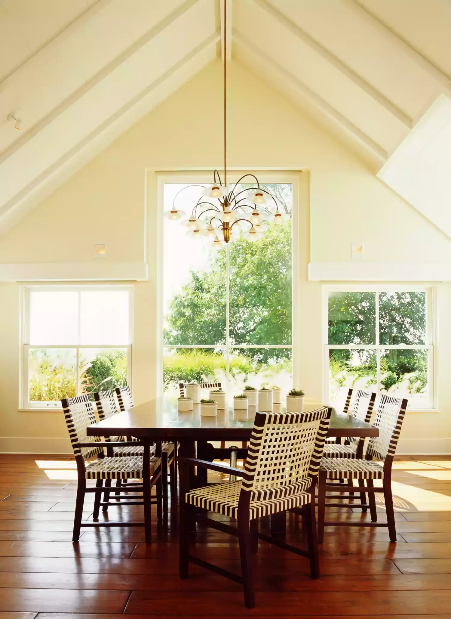 30 Stunning Vaulted Ceiling Ideas to Transform Your Space 15 Hang a Long Chandelier