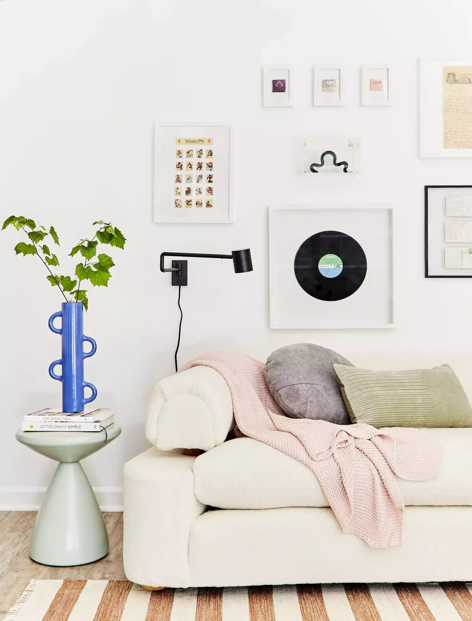 50 Elegant Living Room Ideas That Feel Warm and Inviting 30 Hang a Mixed Media Wall