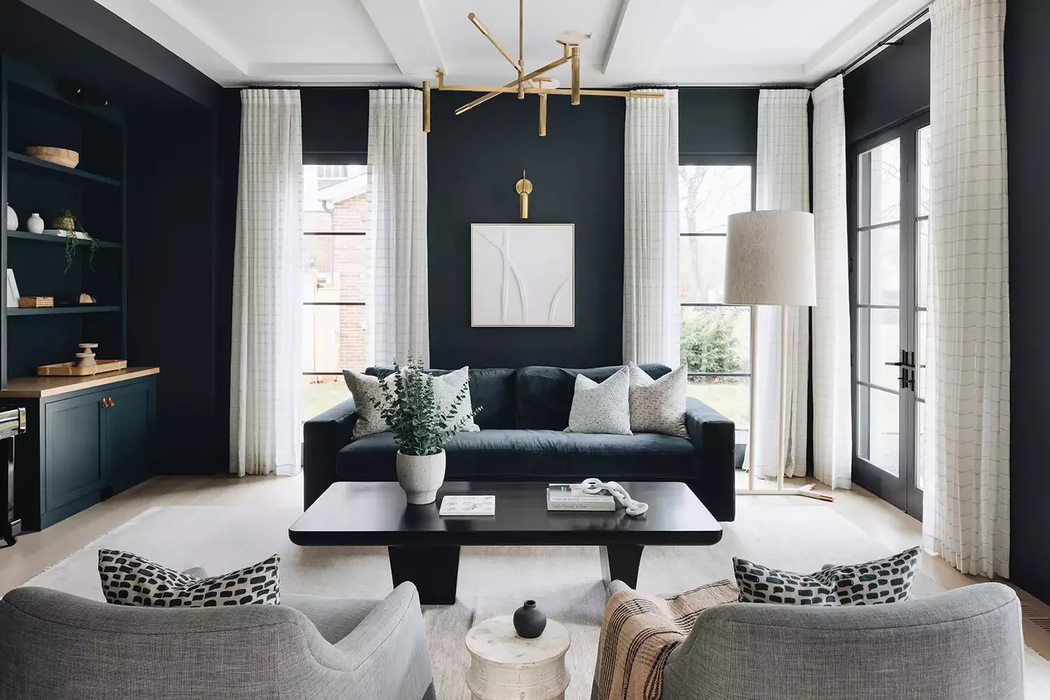 50 Elegant Living Room Ideas That Feel Warm and Inviting 17 Hang a Modern Pendant
