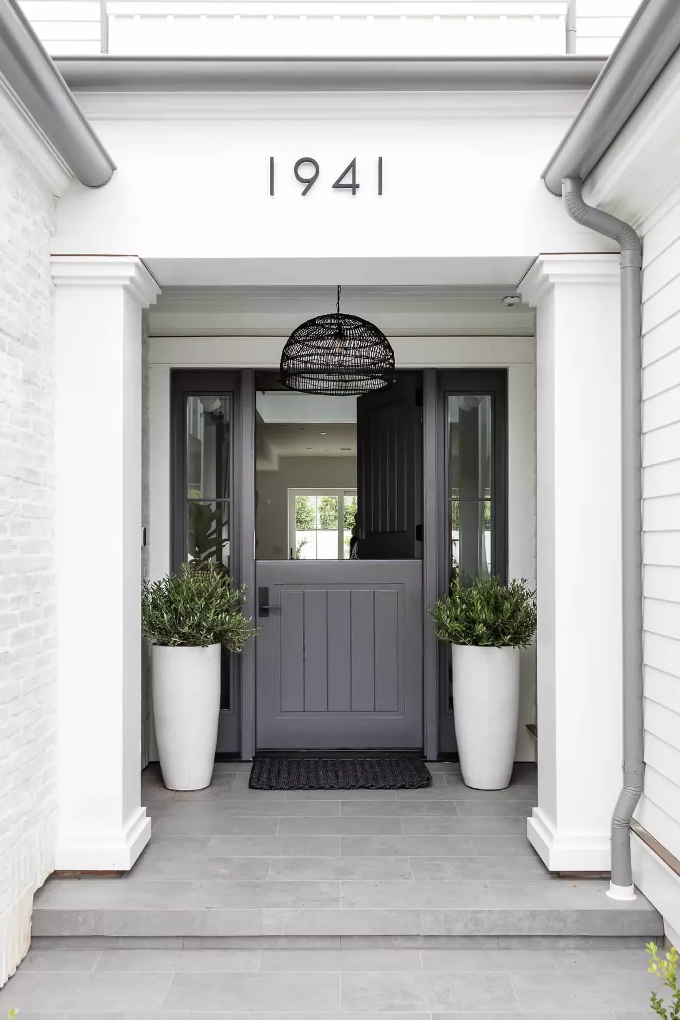 39 Stunning Front Door Decor Ideas to Welcome Every Season Hang a Pendant Light