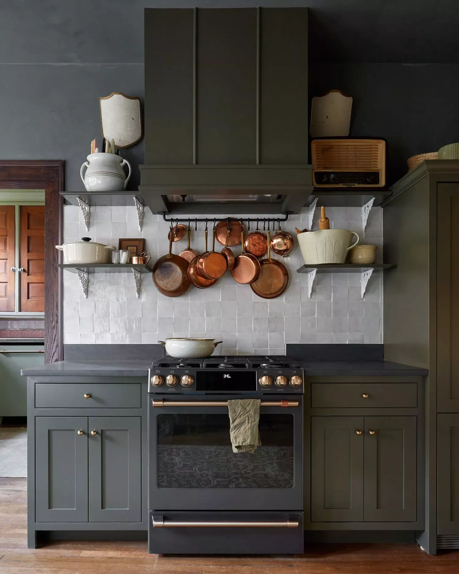 58 Creative Kitchen Decorating Ideas to Transform Your Space with Style Hang a Row of Copper Pots